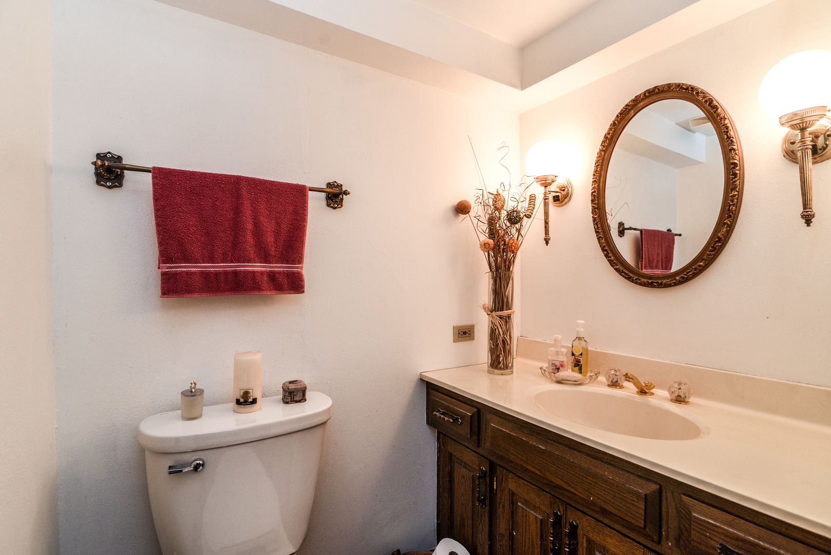 5149 State Road Burbank, IL 60459 - Photo 30 of 36 a bathroom with a sink and a mirror