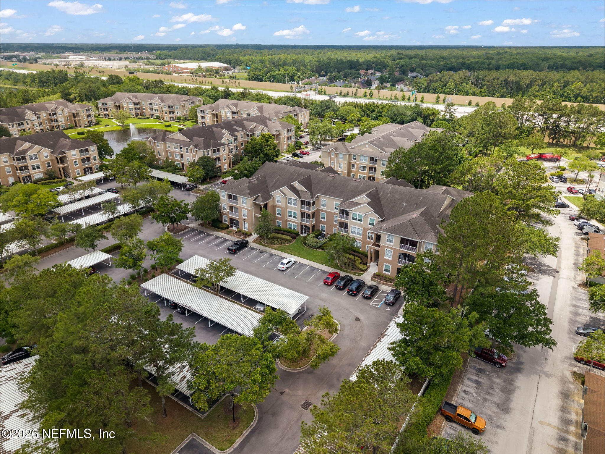 7990 Baymeadows Road East, Unit 520 Jacksonville, FL 32256 - Photo 41 of 41 an aerial view of residential houses with outdoor space