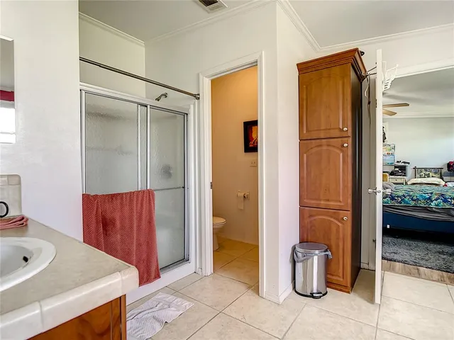 a bathroom with a tub and shower