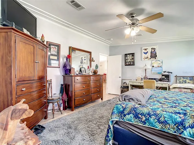 a bed room with a bed and furniture