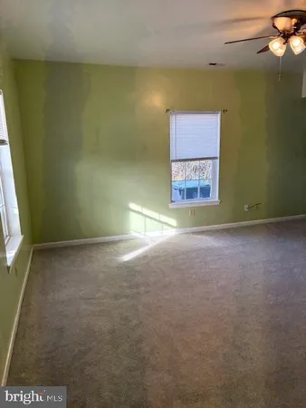 a view of a hallway with a small space