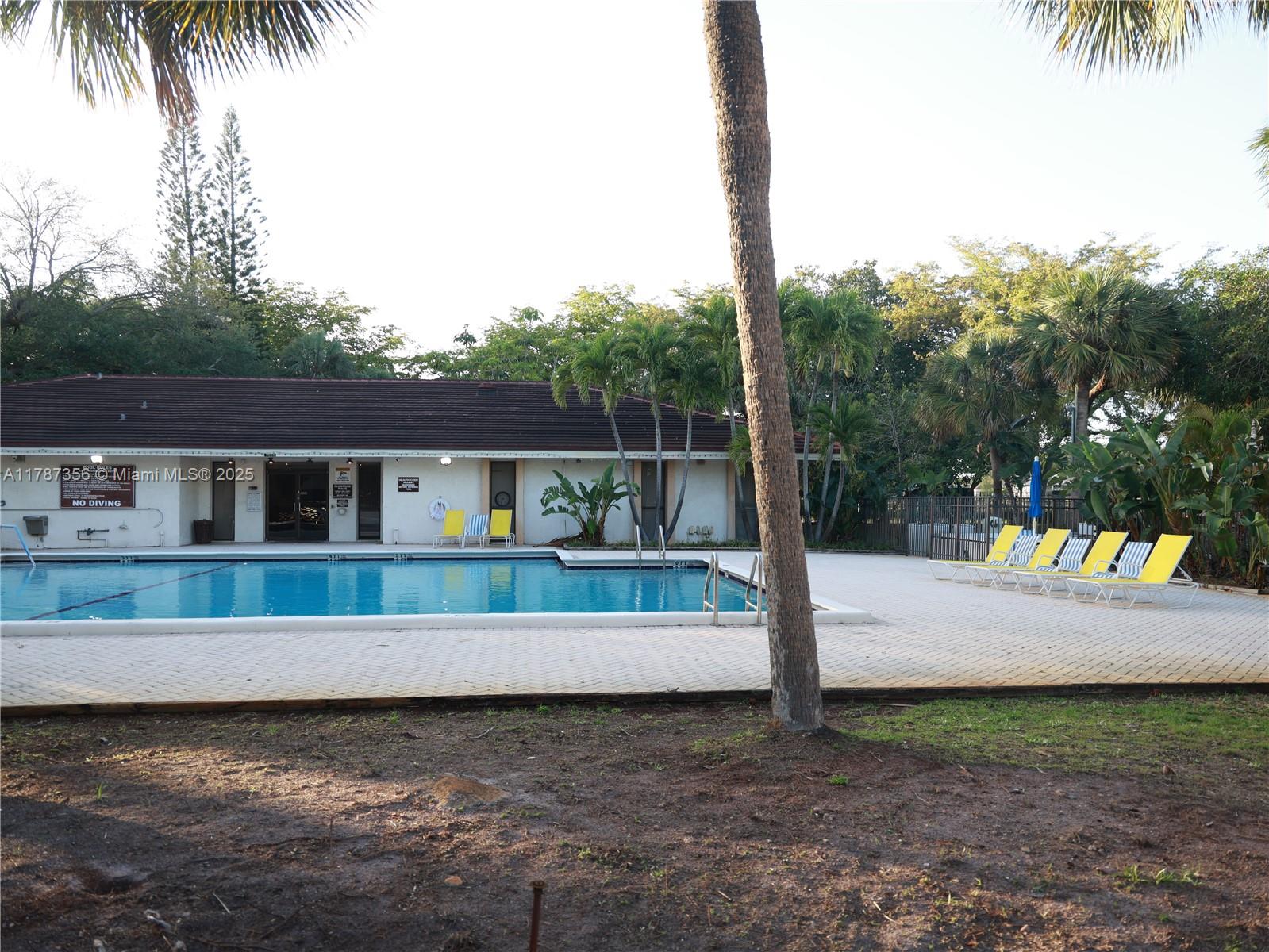 Inverrary Lauderhill, FL 33319 - Photo 23 of 24 a view of a house with a yard