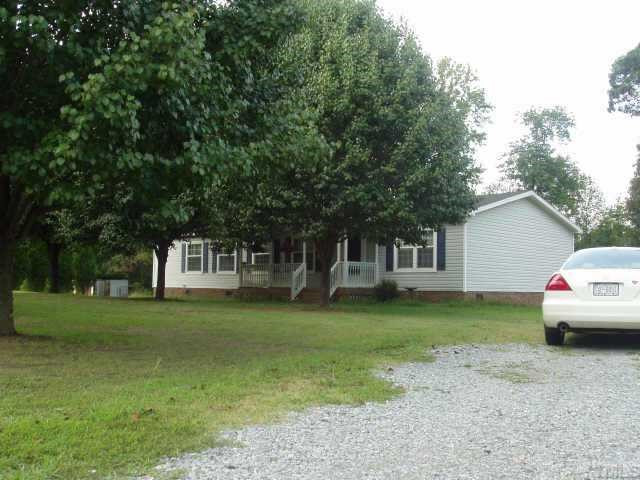 4312 Friendship Road Apex, NC 27539 - Photo 1 of 1 Beautiful Bradford Pear trees adorn the front of the house Exterior Front