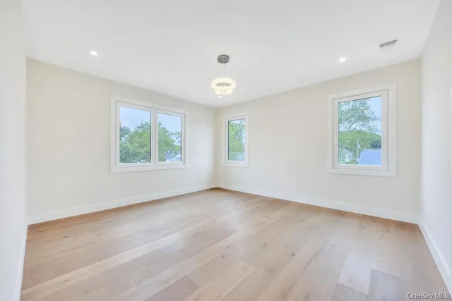 a view of small space with wooden floor