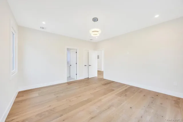 a white bath tub sitting in a bathroom