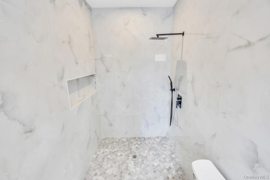 472 Farm Ranch Road East Bethpage, NY 11714 - Photo 25 of 40 Bathroom featuring a marble finish shower and toilet