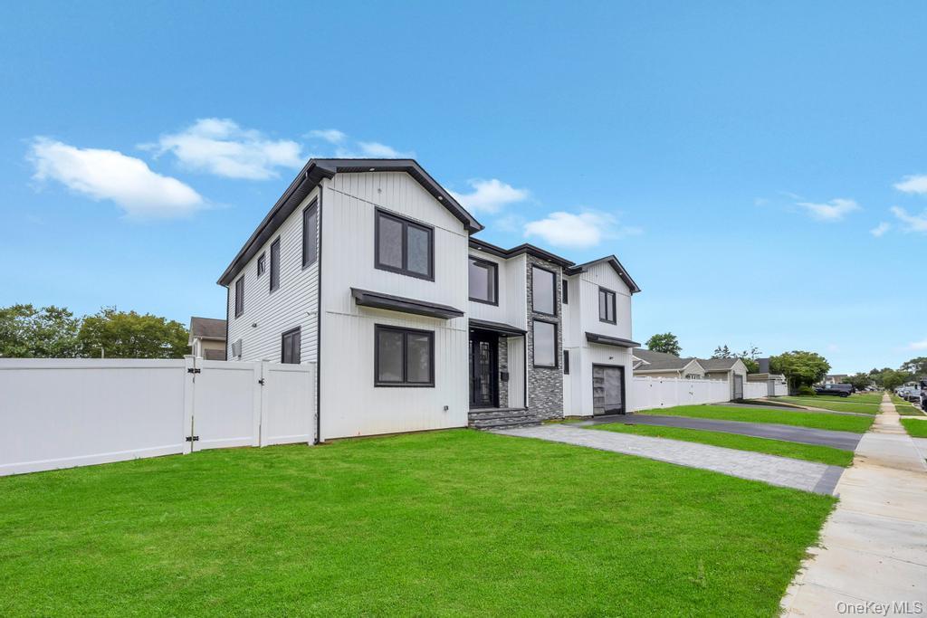 472 Farm Ranch Road East Bethpage, NY 11714 - Photo 3 of 40 Modern inspired farmhouse featuring a gate, a residential view, and driveway