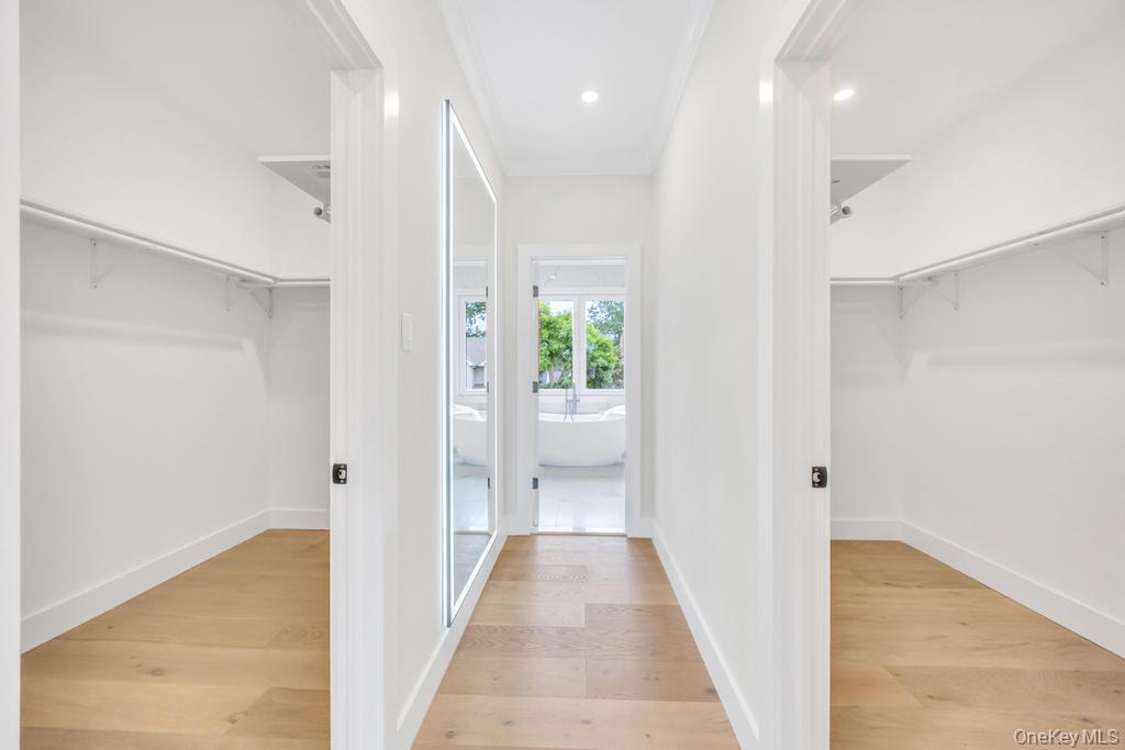 472 Farm Ranch Road East Bethpage, NY 11714 - Photo 31 of 40 Walk in closet featuring light wood-style floors