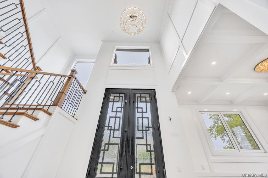 472 Farm Ranch Road East Bethpage, NY 11714 - Photo 35 of 40 a view of an entryway with wooden floor