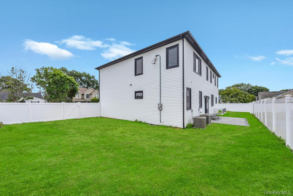 472 Farm Ranch Road East Bethpage, NY 11714 - Photo 40 of 40 a front view of a house with garden