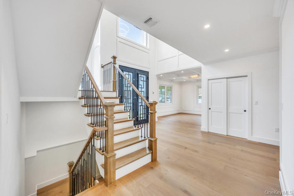 472 Farm Ranch Road East Bethpage, NY 11714 - Photo 10 of 40 a view of entryway and hall with wooden floor