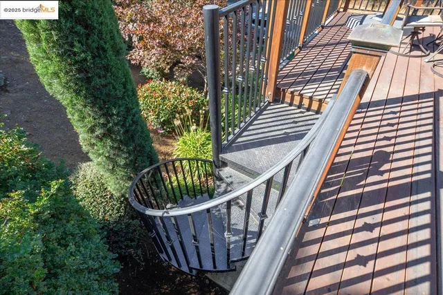 a view of balcony with wooden floor and outdoor space