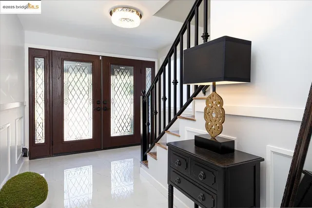 a view of entryway with a front door