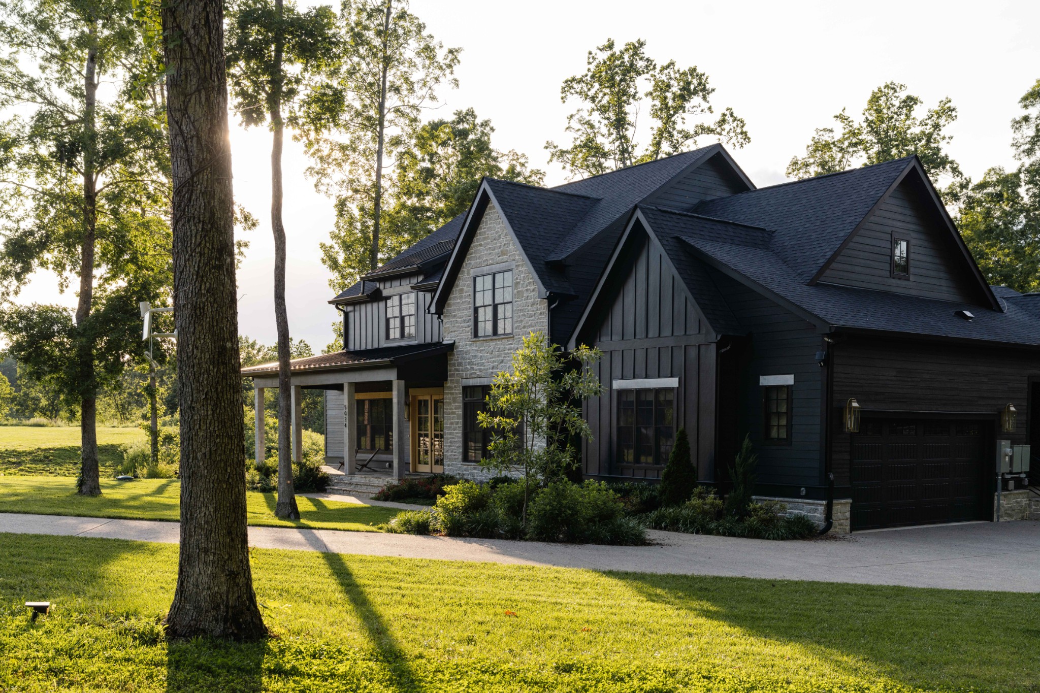 5024 Cobbler Ridge Road Franklin, TN 37064 - Photo 1 of 58 a house view with a garden space