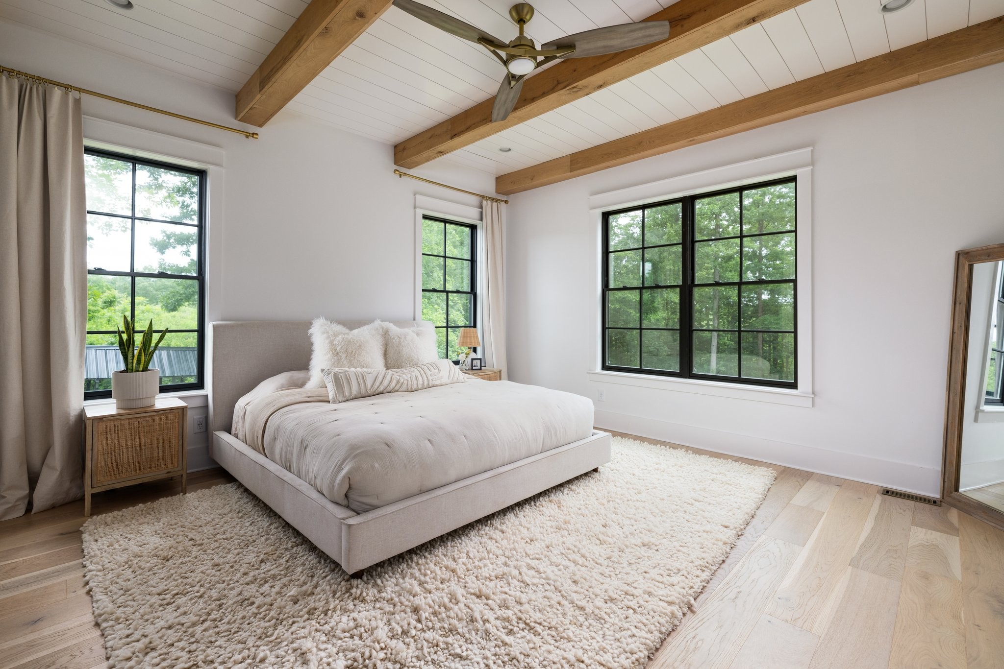 5024 Cobbler Ridge Road Franklin, TN 37064 - Photo 26 of 58 a bedroom with a large bed and a large window