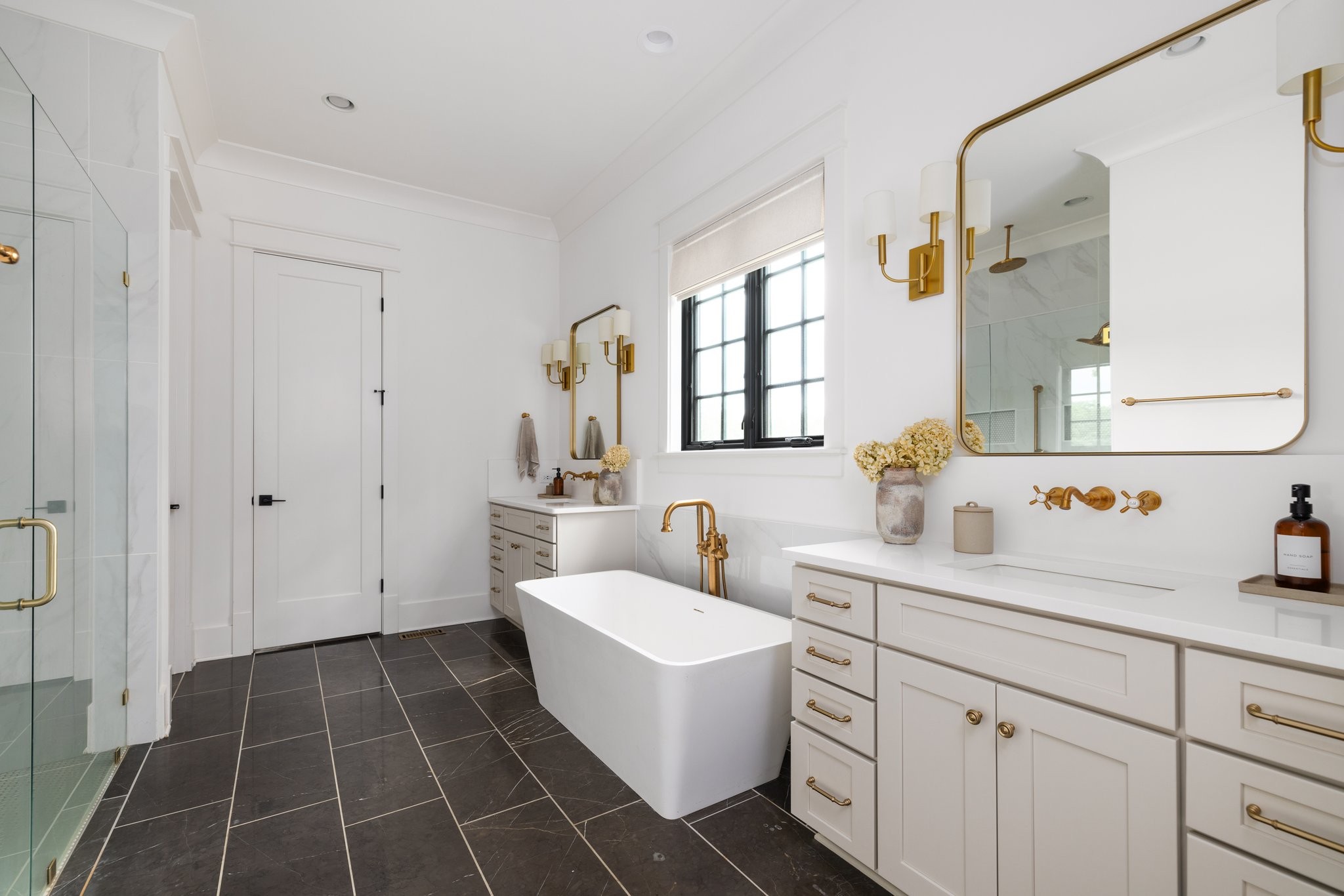 5024 Cobbler Ridge Road Franklin, TN 37064 - Photo 28 of 58 a bathroom with a sink toilet vanity and tub