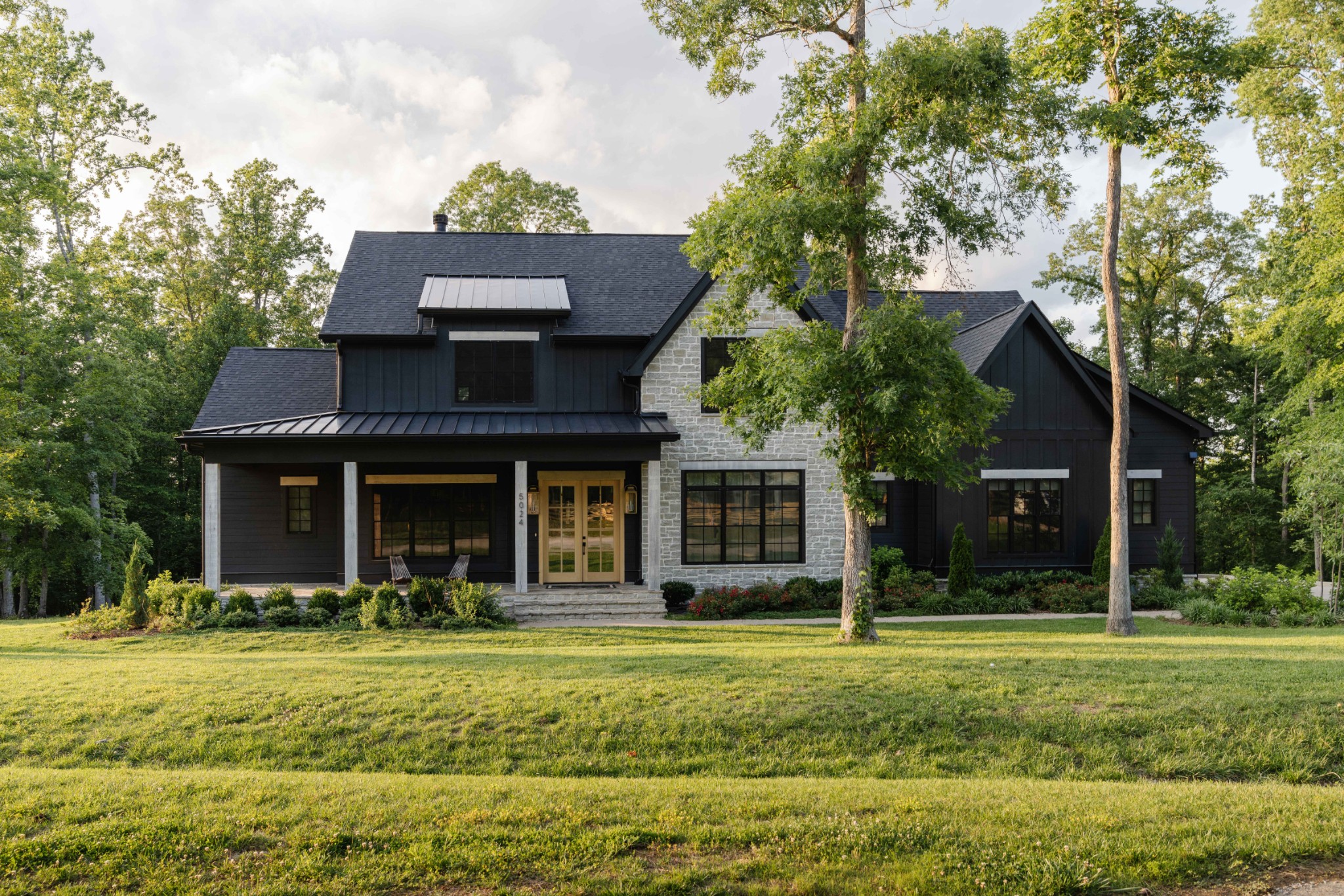 5024 Cobbler Ridge Road Franklin, TN 37064 - Photo 3 of 58 a front view of a house with a yard