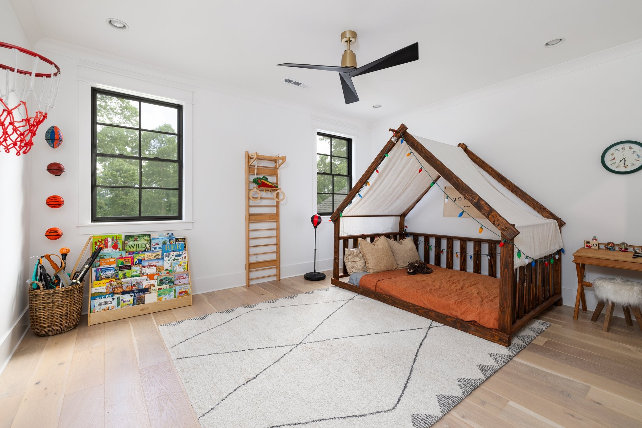 5024 Cobbler Ridge Road Franklin, TN 37064 - Photo 39 of 58 a view of a bedroom with furniture and toys