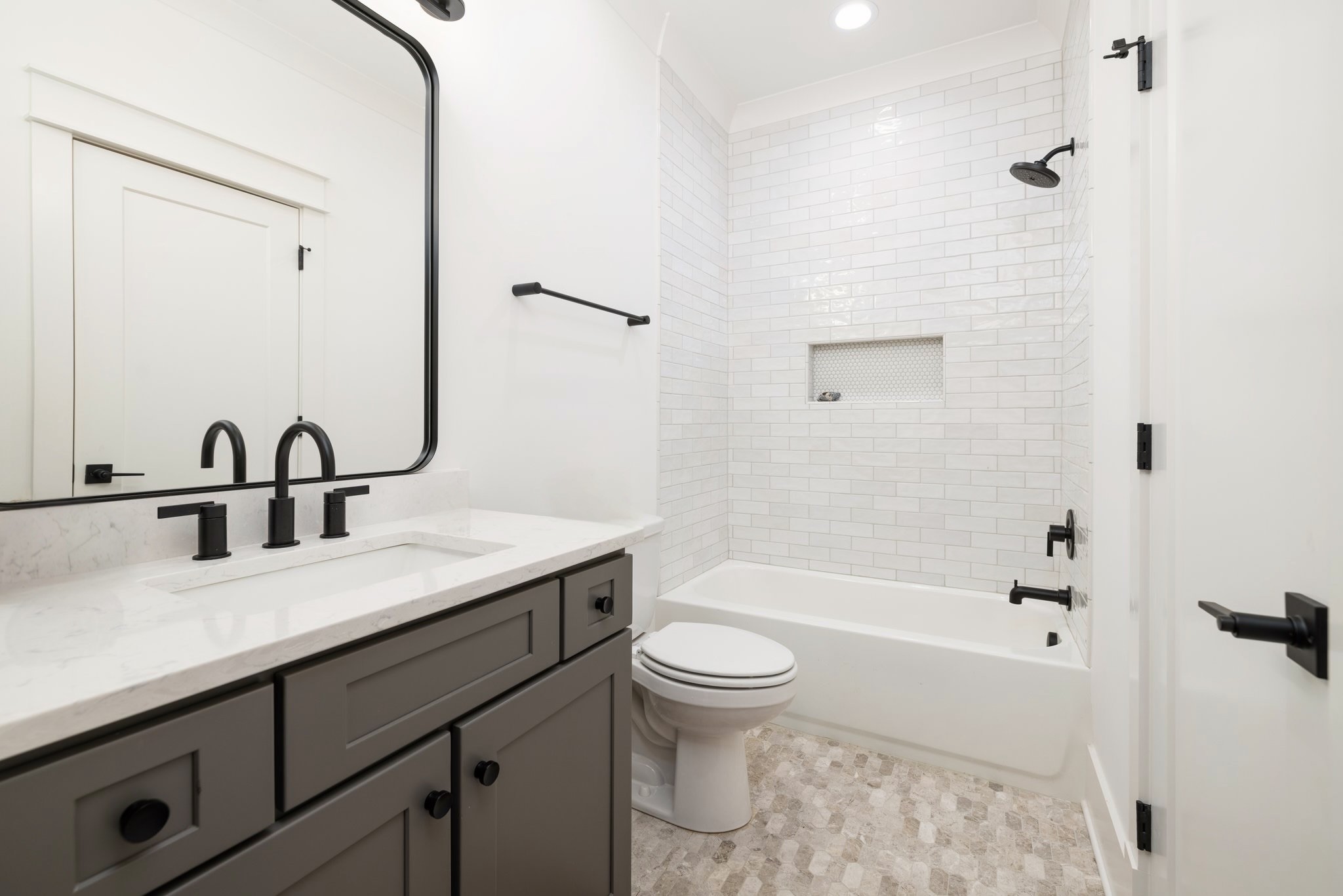 5024 Cobbler Ridge Road Franklin, TN 37064 - Photo 40 of 58 a bathroom with a sink a toilet and shower