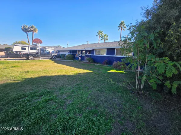 a view of a house with a swimming pool