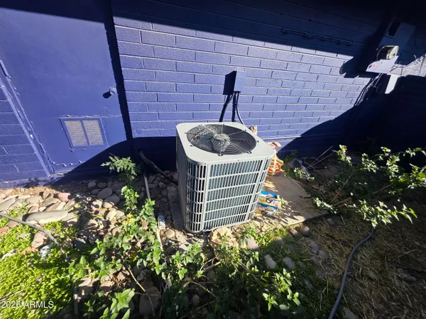 a bathroom with a sink and flowers