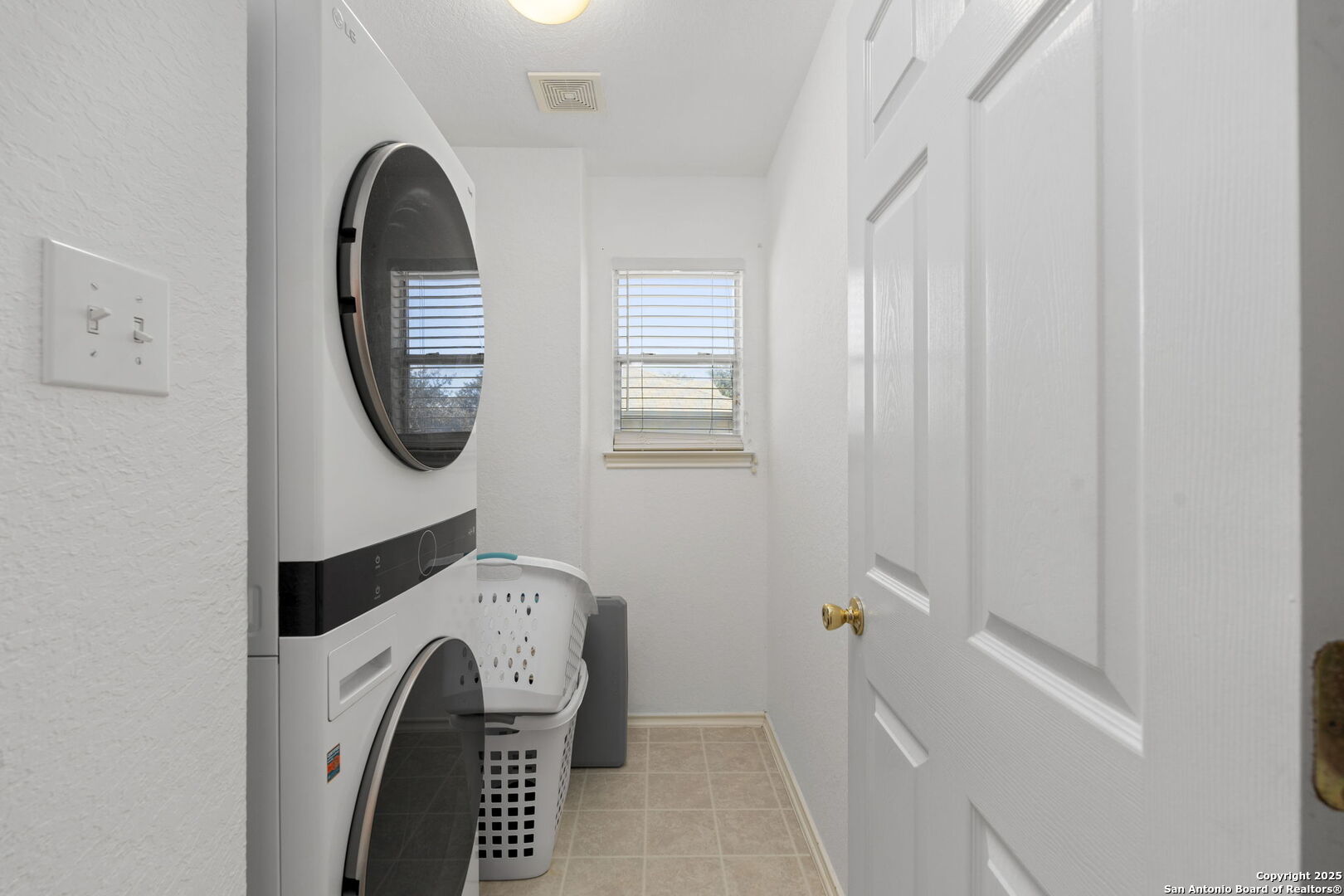 8947 Burnt Path Helotes, TX 78023 - Photo 20 of 34 a close view of cabinet with mirror