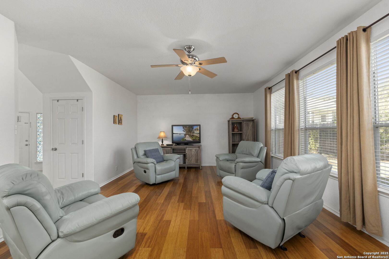 8947 Burnt Path Helotes, TX 78023 - Photo 6 of 34 a living room with furniture and a large window
