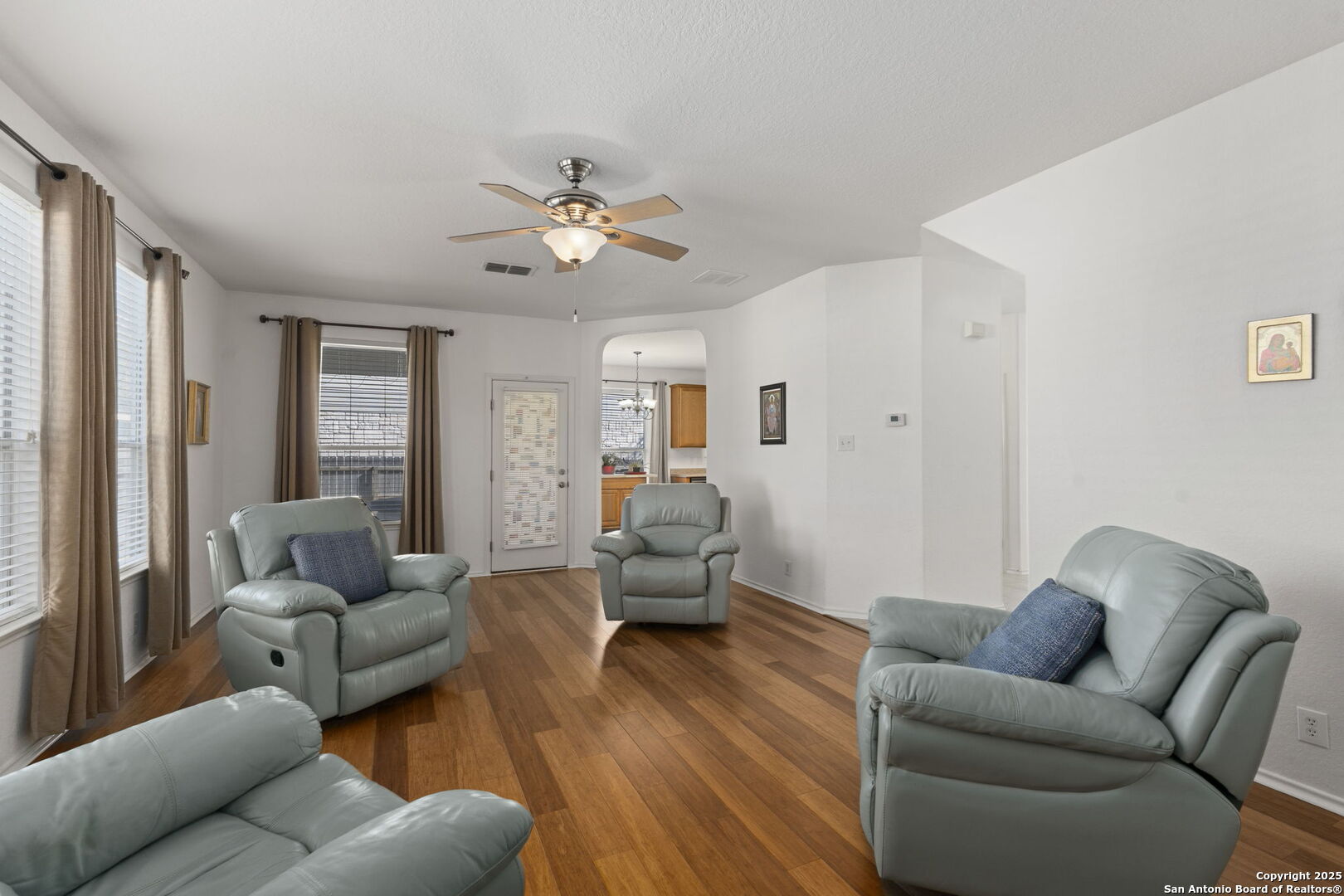 8947 Burnt Path Helotes, TX 78023 - Photo 7 of 34 a living room with furniture and wooden floor
