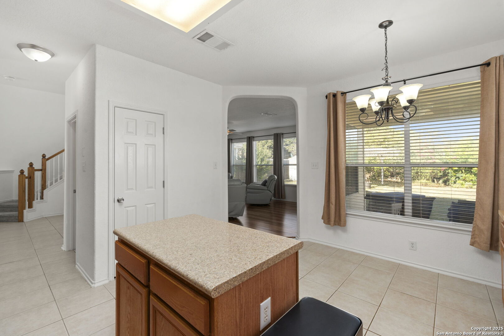 8947 Burnt Path Helotes, TX 78023 - Photo 8 of 34 a kitchen that has a lot of fruit in it