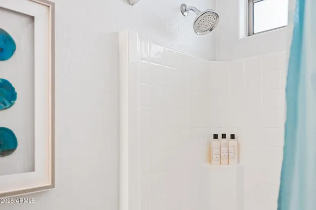 a balcony with furniture and rug