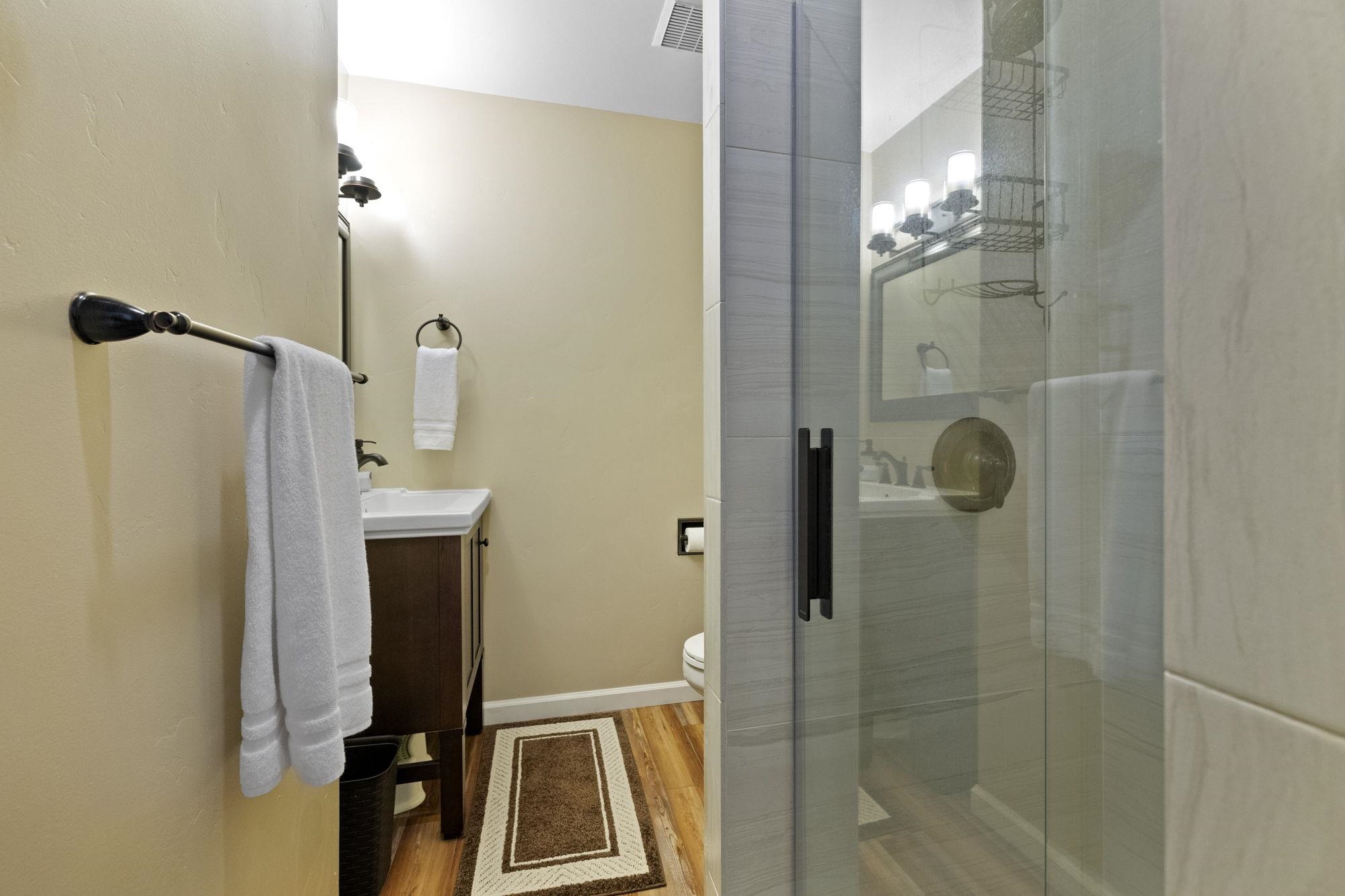 33757 Upper Leland Road, Unit B Pinecrest, CA 95364 - Photo 11 of 39 a bathroom with a shower