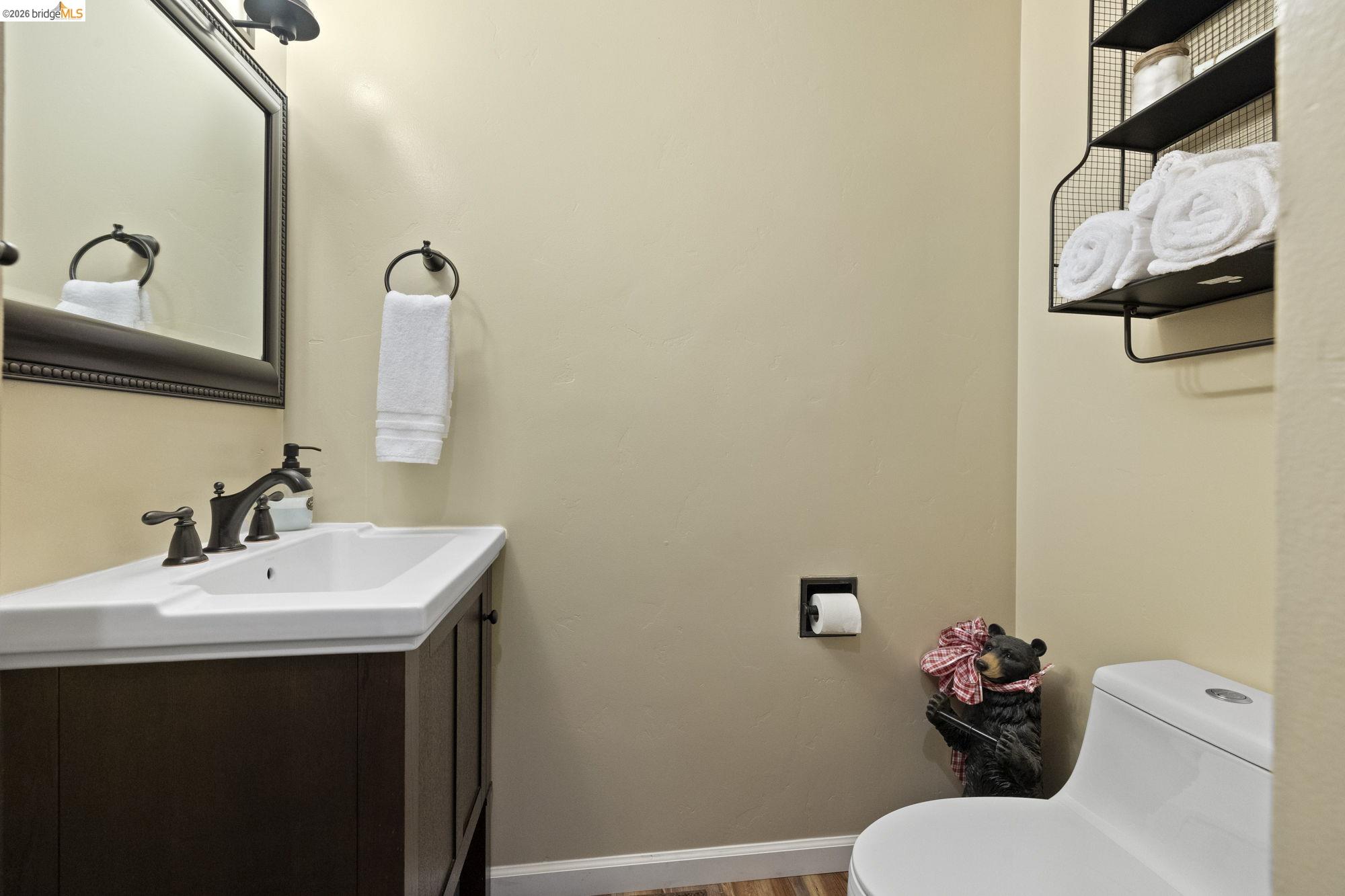 33757 Upper Leland Road, Unit B Pinecrest, CA 95364 - Photo 12 of 39 a bathroom with a sink mirror and toilet