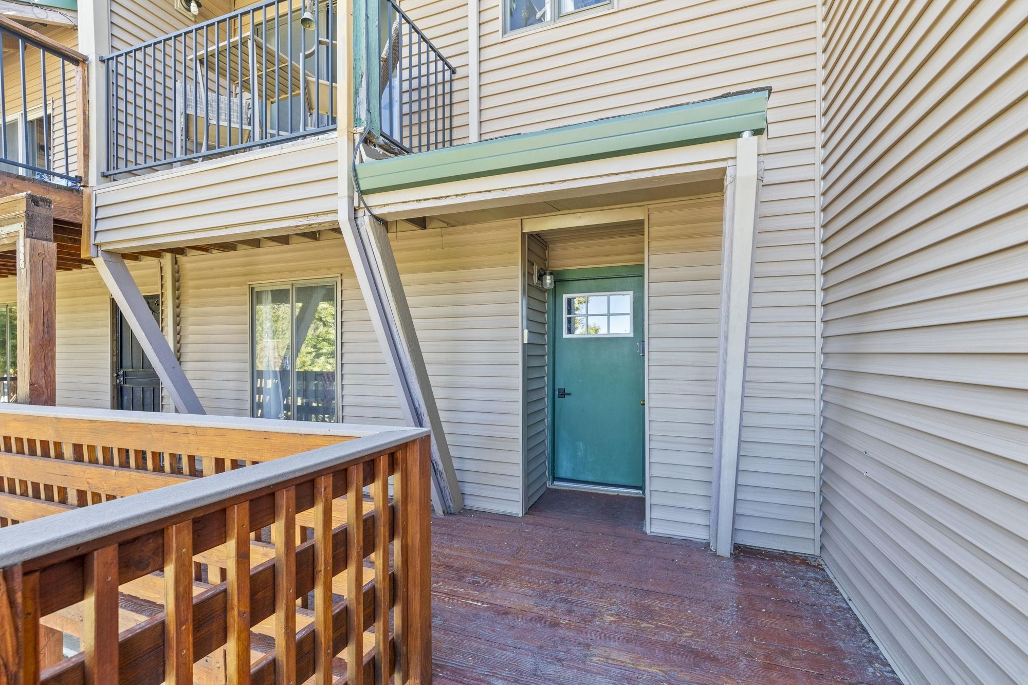 33757 Upper Leland Road, Unit B Pinecrest, CA 95364 - Photo 18 of 39 a view of a balcony with furniture and wooden deck