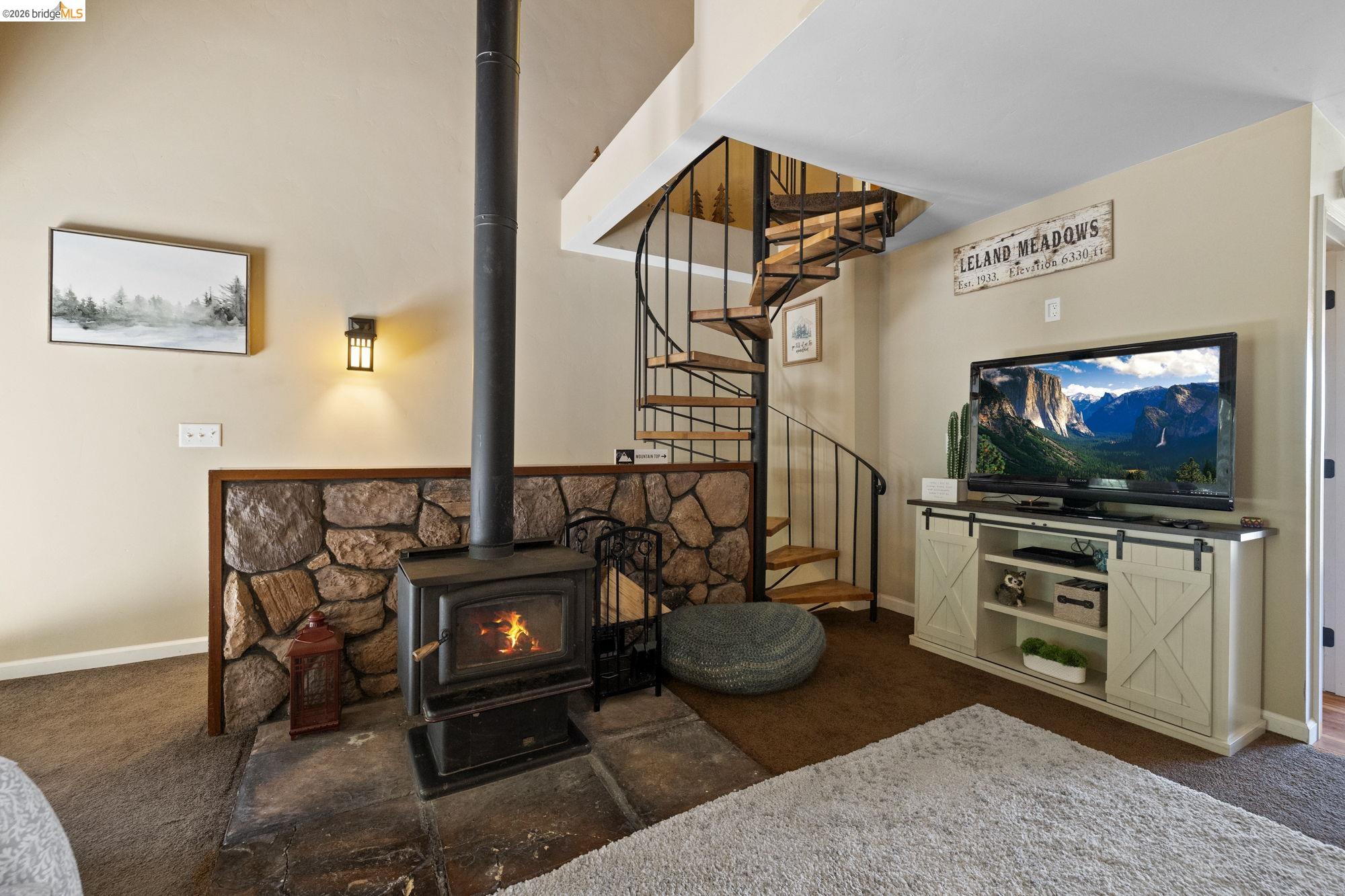 33757 Upper Leland Road, Unit B Pinecrest, CA 95364 - Photo 29 of 39 a living room with furniture and a flat screen tv