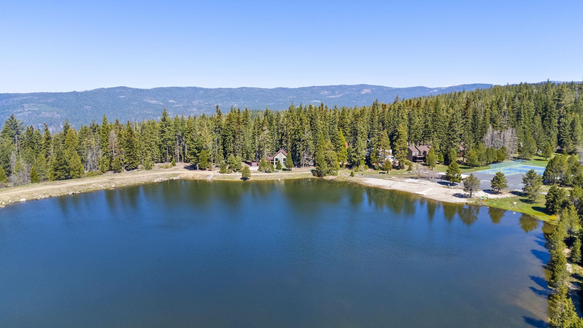 33757 Upper Leland Road, Unit B Pinecrest, CA 95364 - Photo 35 of 39 a view of an ocean with mountains in the background