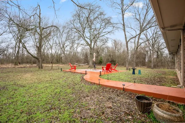 a childrens park with lots of trees