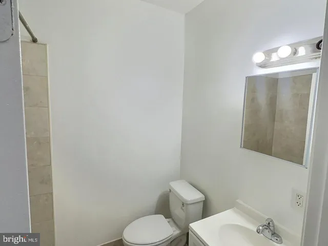 a view of a livingroom with wooden floor