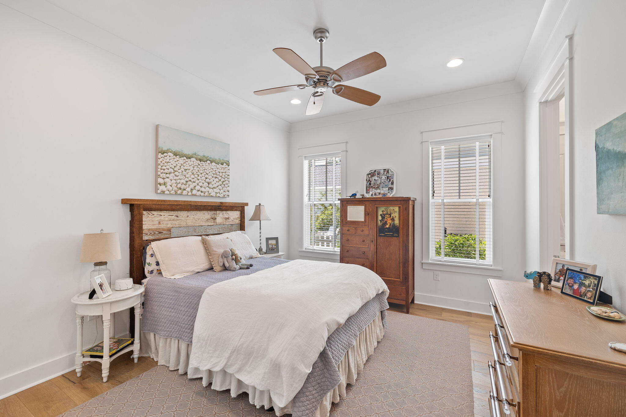 158 Trailhead Drive Inlet Beach, FL 32461 - Photo 28 of 35 a bedroom with a bed and a chandelier