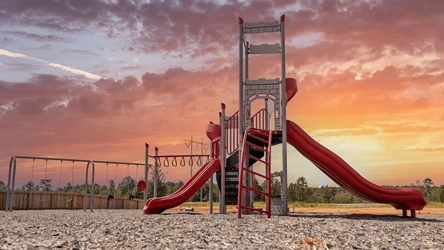 a view of a roof deck with a wooden fence