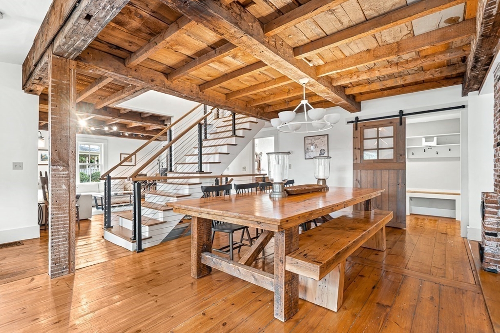 9 Chapman Avenue Andover, MA 01810 - Photo 17 of 39 a room with wooden furniture and wooden floor