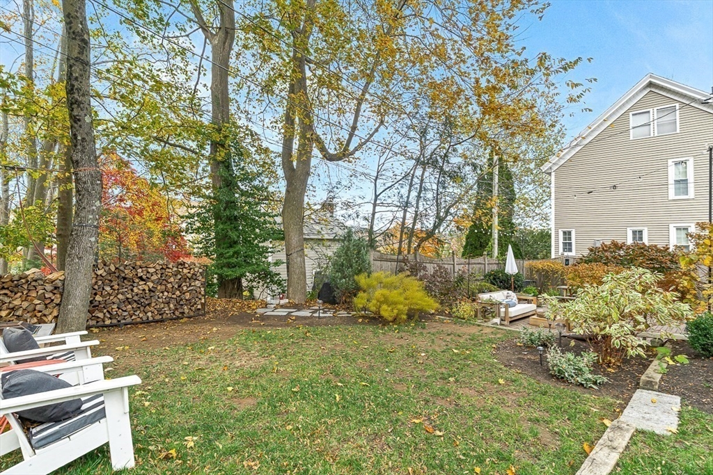 9 Chapman Avenue Andover, MA 01810 - Photo 32 of 39 a backyard of a house with lots of green space