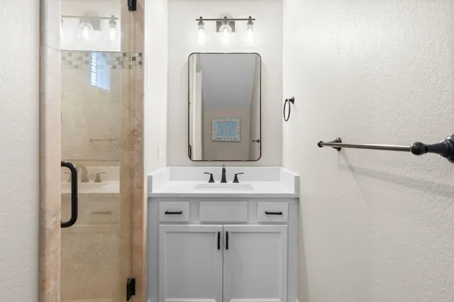 a view of a city with tall buildings in the background