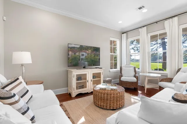 a bedroom with a bed and a night stand