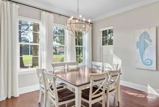 a bathroom with a granite countertop sink toilet a mirror and shower