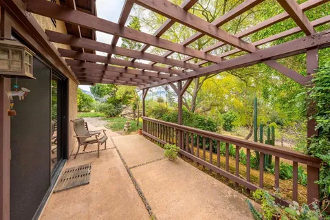 a view of porch with a swimming pool