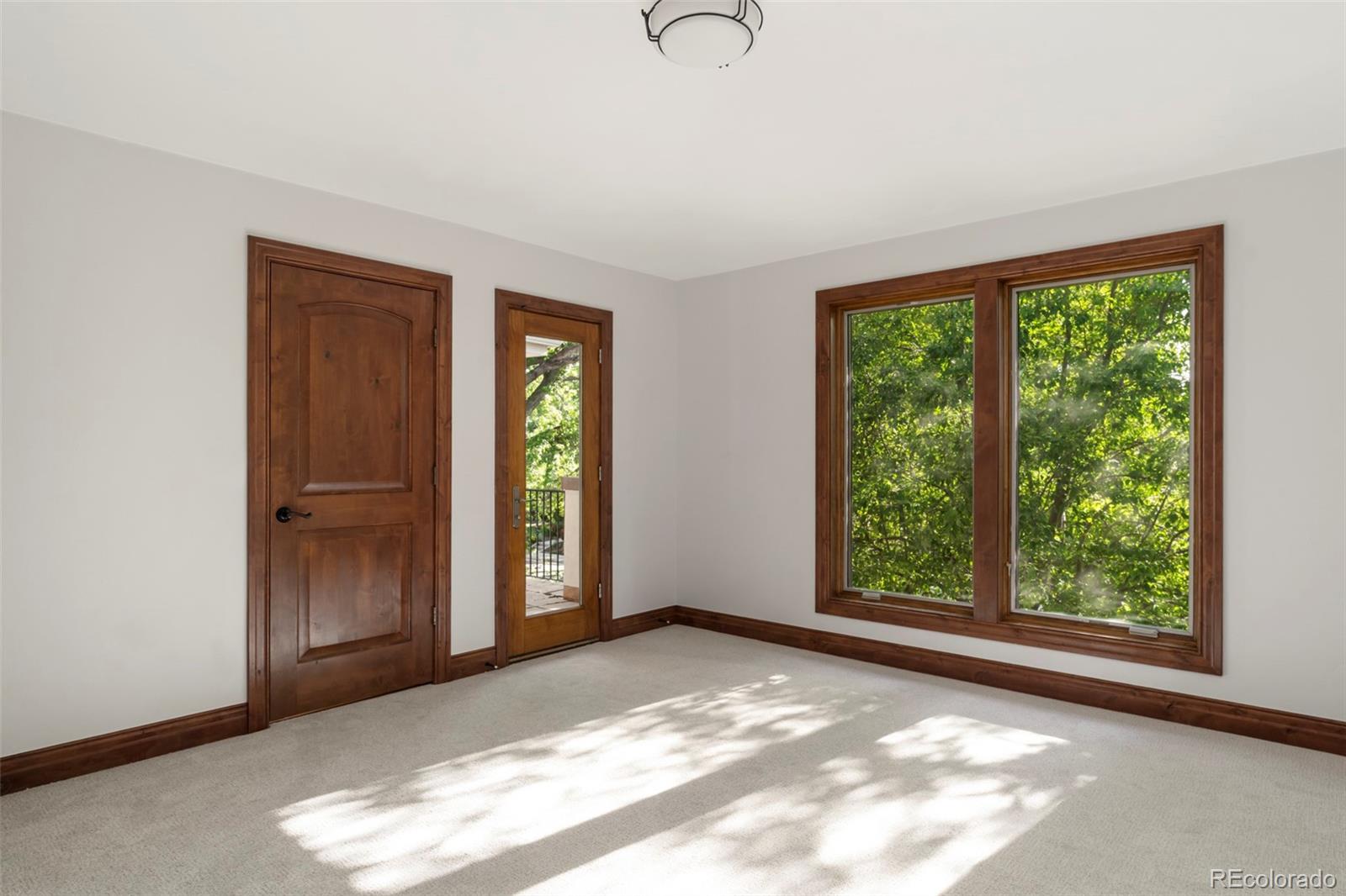 1026 South Cook Street Denver, CO 80209 - Photo 25 of 34 a view of an empty room with window and bathroom