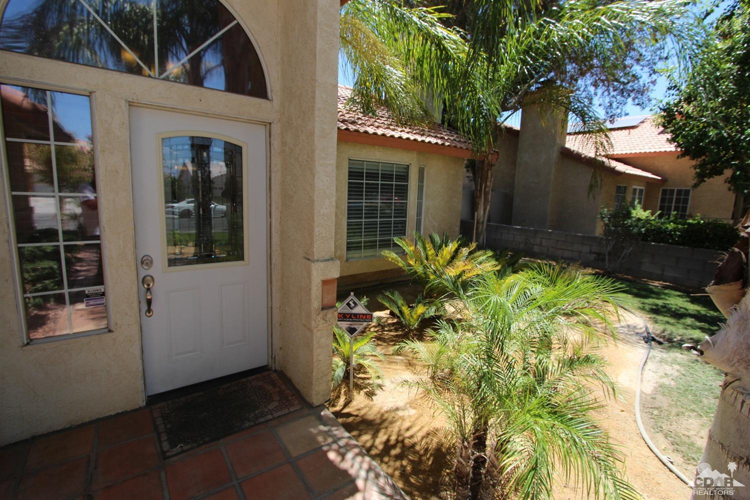 68335 Risueno Road Cathedral City, CA 92234 - Photo 2 of 32 front view of a house