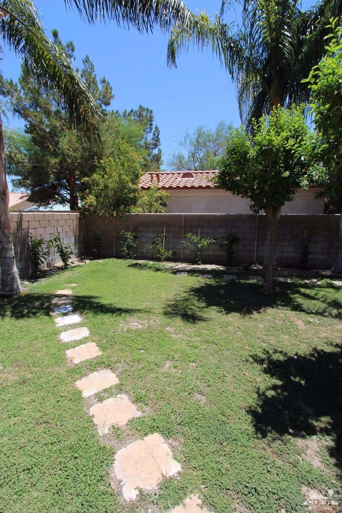 68335 Risueno Road Cathedral City, CA 92234 - Photo 5 of 32 a view of a backyard