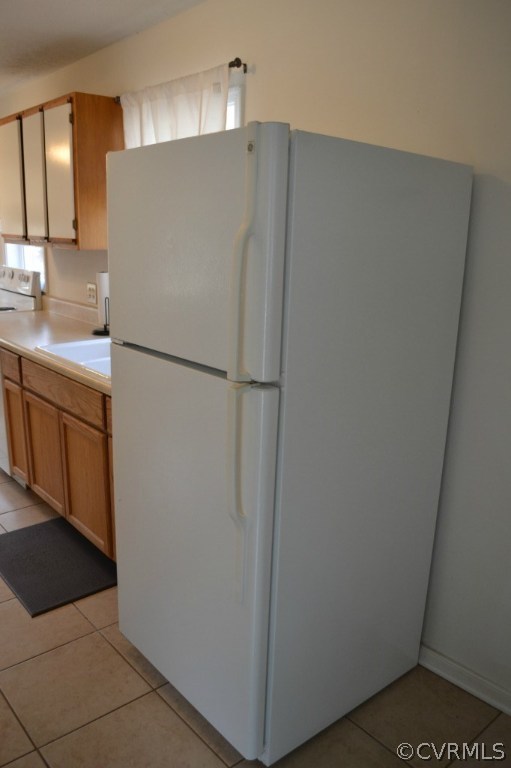 4410 Courthouse Road Midlothian, VA 23112 - Photo 15 of 21 a white refrigerator freezer sitting in a kitchen