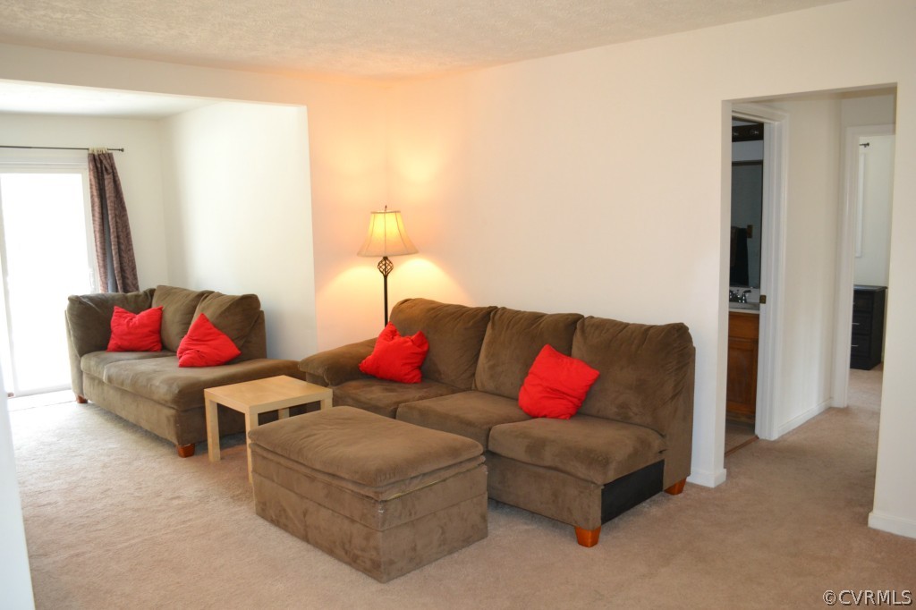 4410 Courthouse Road Midlothian, VA 23112 - Photo 5 of 21 a living room with furniture and a couch